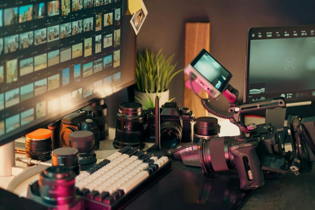 Explore a high-end video editing workspace complete with cameras, lenses, and monitors.